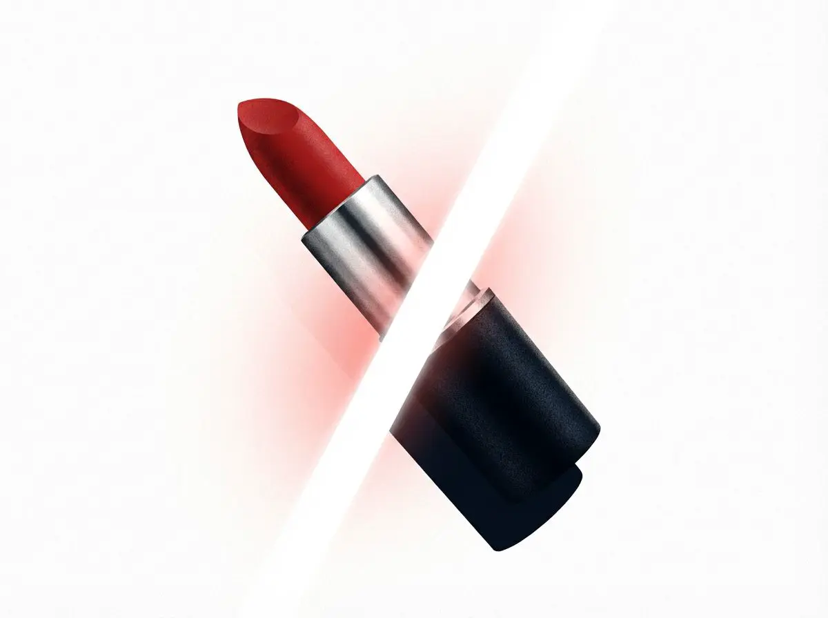 Red lipstick crossed by a beam of light